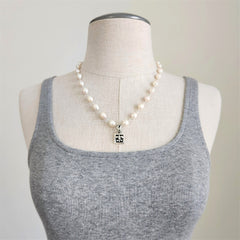 WHITE PEARL NECKLACE WITH FLEUR DE LIS PENDANT-17"