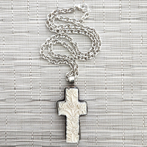 6--CARVED FLORAL CROSS ON 925 SILVER CHAIN