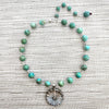 TURQUOISE NECKLACE WITH MOTHER OF PEARL FLOWER