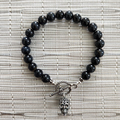 BLUE TIGERS EYE (8MM) BRACELET WITH SKULL CHARM