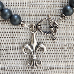 HEMATINE BRACELET WITH FLEUR DE LIS CHARM