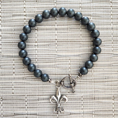 HEMATINE BRACELET WITH FLEUR DE LIS CHARM