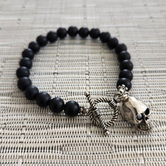 MATTE BLACK ONYX (8MM) BRACELET WITH SKULL CHARM