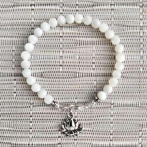 MOTHER OF PEARL BRACELET WITH LOTUS CHARM