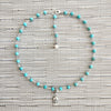 4--TURQUOISE NECKLACE WITH FLEUR DE LIS TAG