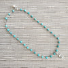 4--TURQUOISE NECKLACE WITH FLEUR DE LIS TAG