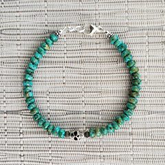 3--TURQUOISE (6MM) BRACELET WITH 925 SKULL BEAD