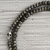 0--PYRITE NECKLACE WITH 925 SILVER SKULL BEAD