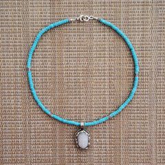 7--TURQUOISE HEISHI NECKLACE WITH BUDDHA PENDANT