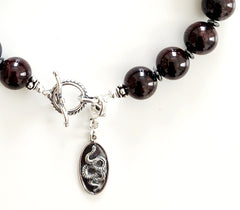 0--GARNET BRACELET W/ 925 SNAKE AMULET