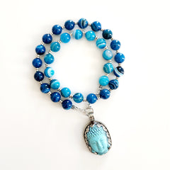 0--BLUE STRIPE AGATE NECKLACE W/ BUDDHA PENDANT-18"