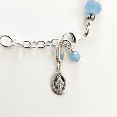 0--LT BLUE AGATE BRACELET W/ 925 MARY CHARM