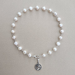 0--WHITE PEARL NECKLACE W/ OM PENDANT-16"