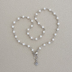 MINI WHITE PEARL NECKLACE WITH 8 POINT STAR-16"