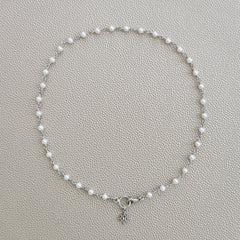 MINI WHITE PEARL NECKLACE WITH 8 POINT STAR-16"