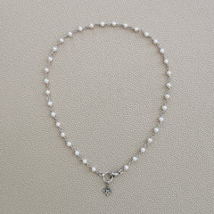 MINI WHITE PEARL NECKLACE WITH 8 POINT STAR-16"