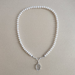 0--WHITE PEARL NECKLACE W/ BUDDHA PENDANT--18"