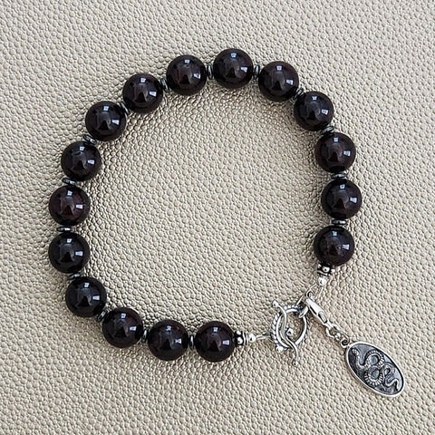 GARNET BRACELET W/ 925 SNAKE AMULET
