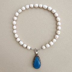 0--WHITE EDISON PEARL NECKLACE W/ BLUE CHALCEDONY PENDANT--16"
