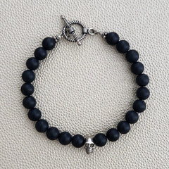 MATTE BLACK ONYX (8MM) BRACELET WITH SKULL BEAD