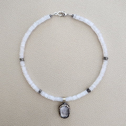 CLEAR QUARTZ NECKLACE W/ BUDDHA PENDANT