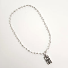 0--WHITE ONYX NECKLACE WITH FLEUR DE LIS CROSS-24"