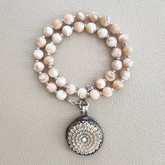 0--MOTHER OF PEARL NECKLACE  W/ FLOWER PENDANT--18"