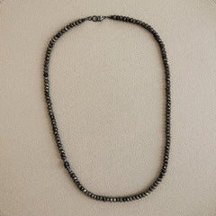 PYRITE NECKLACE WITH 925 SILVER SKULL BEAD
