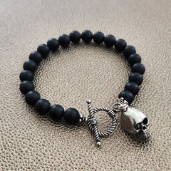 MATTE BLACK ONYX BRACELET W/ SKULL CHARM