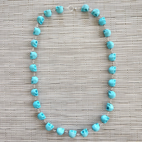 Y--TURQUOISE COLORED SKULL BEAD NECKLACE-28"
