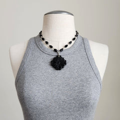 BLACK ONYX NECKLACE WITH CARVED PENDANT-18"