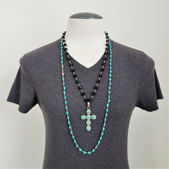 TURQUOISE COLORED SKULL BEAD NECKLACE-42 INCHES